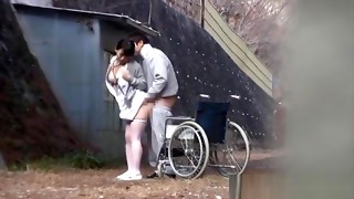 Horny Japanese nurse sucks cock in front of a voyeur